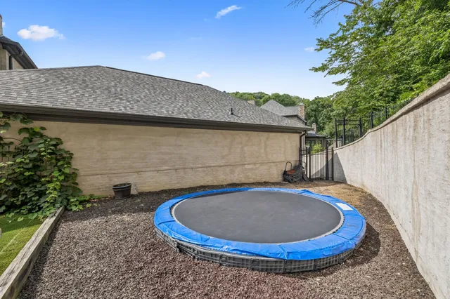 a view of swimming pool with outdoor seating