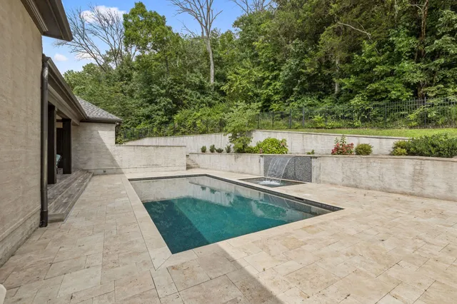a stone house with a door and a window