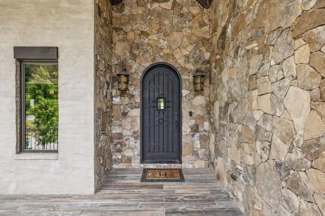 a view of a livingroom with furniture and hardwood floor