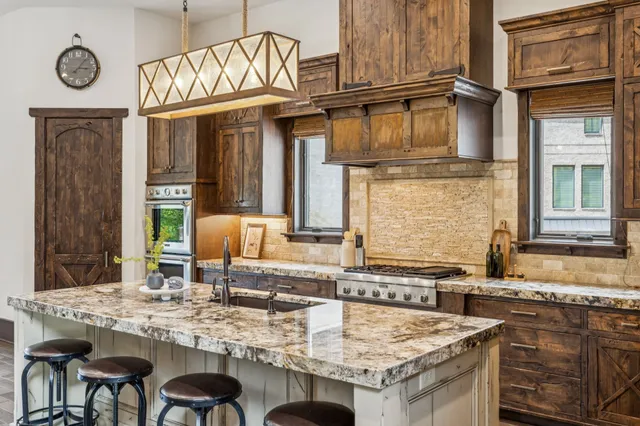 a view of a a dining room with furniture window and wooden floor