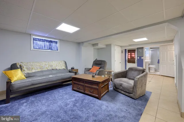 a living room with furniture and a couch