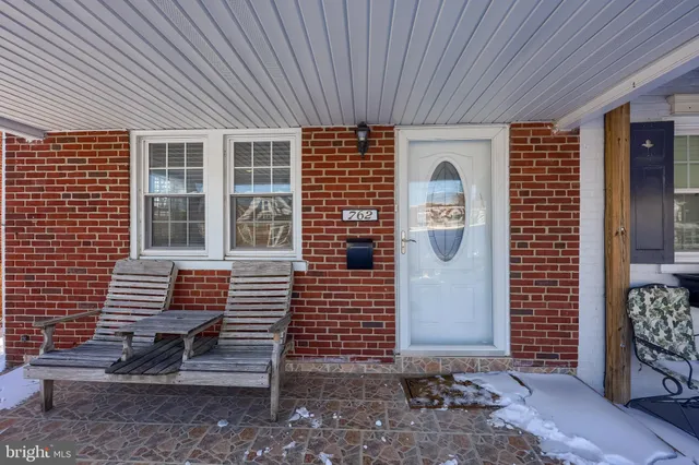 a front view of a house with a balcony