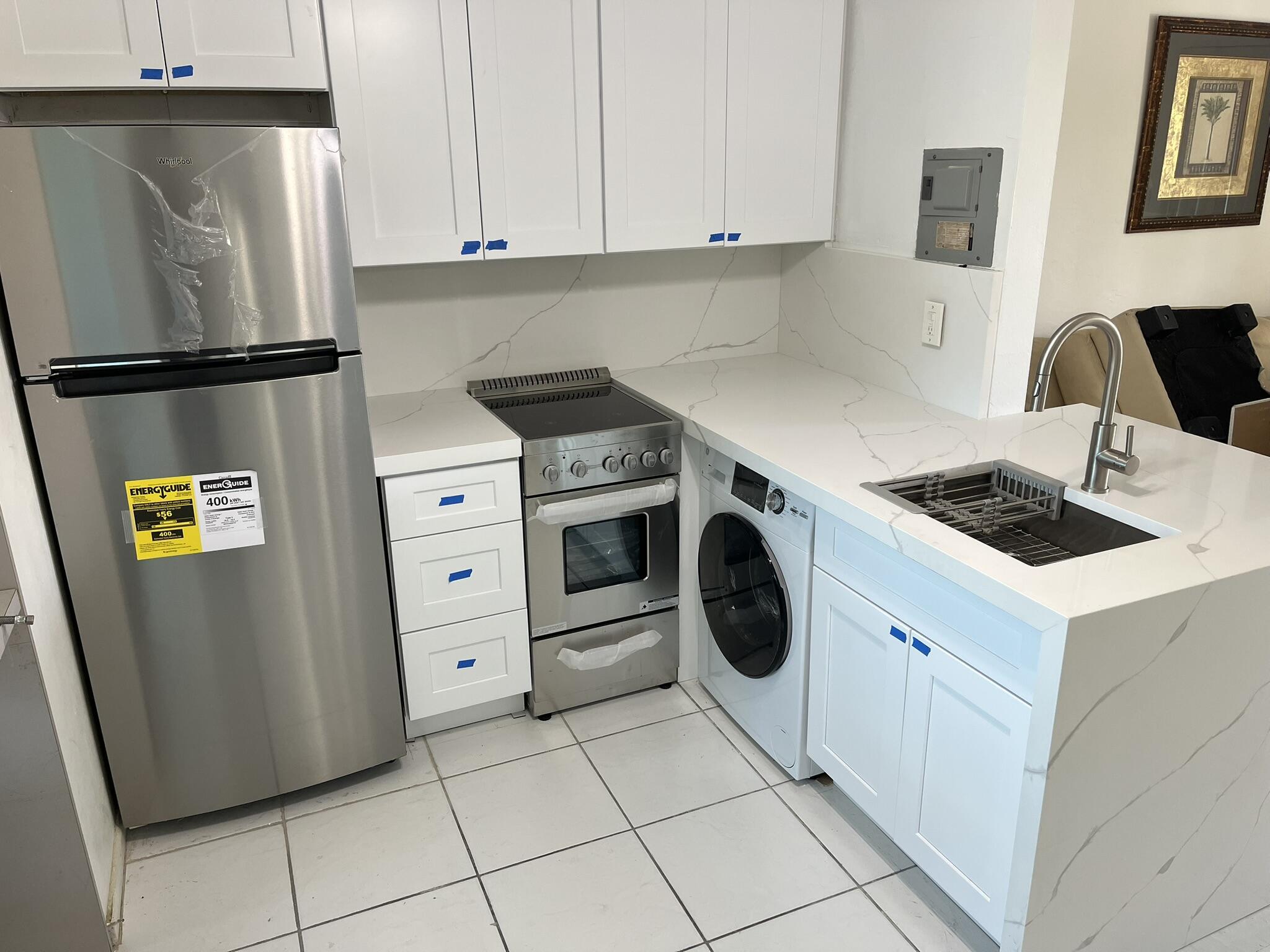 1172 Surf Road, Unit A3 Riviera Beach, FL 33404 - Photo 1 of 9 beyc681521666f476