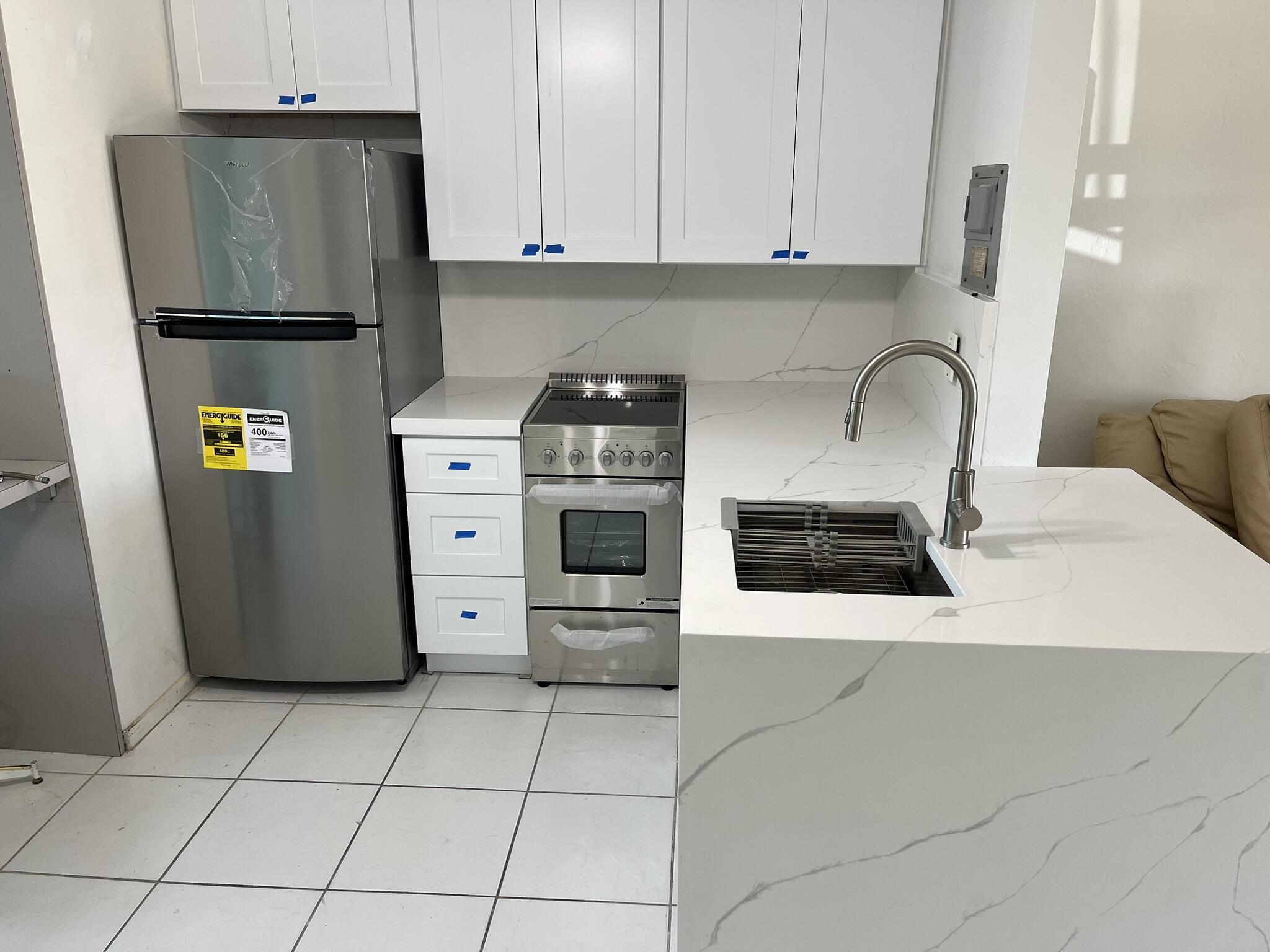 1172 Surf Road, Unit A3 Riviera Beach, FL 33404 - Photo 2 of 9 beyc68152141a7487