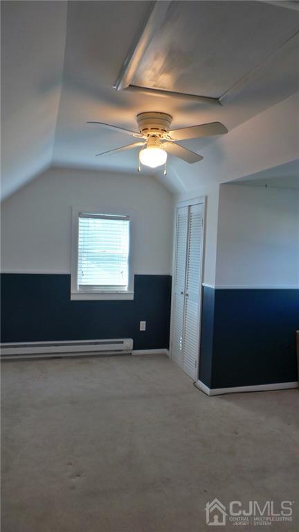 57 Orange Street Edison, NJ 08817 - Photo 11 of 15 a view of a livingroom with a projector