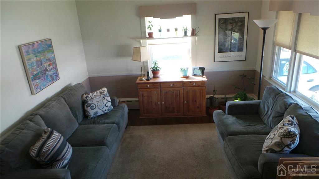 57 Orange Street Edison, NJ 08817 - Photo 3 of 15 a living room with furniture and a window