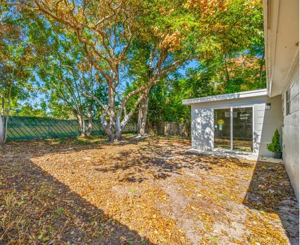 a house with trees in front of it