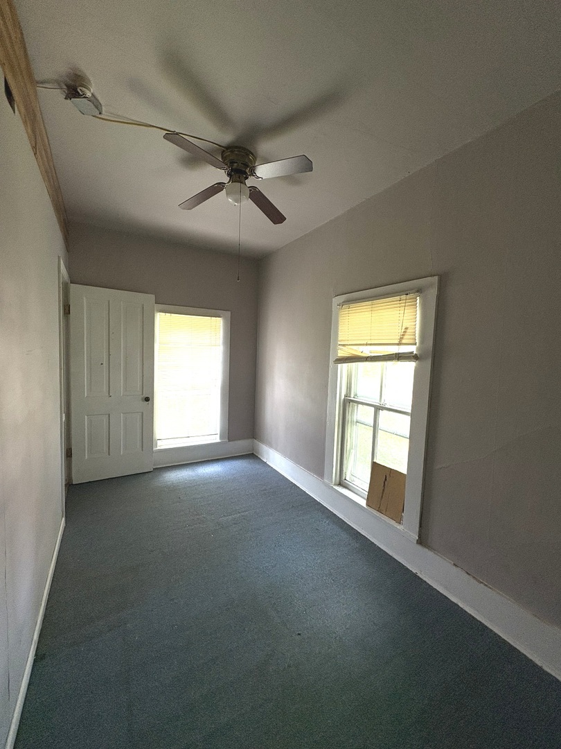 411 Depot Street Mazon, IL 60444 - Photo 24 of 34 a view of empty room with windows