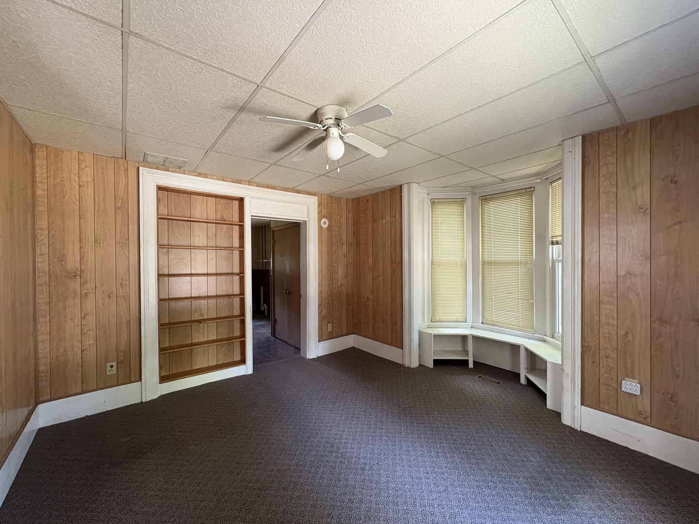411 Depot Street Mazon, IL 60444 - Photo 4 of 34 an empty room with a empty space and windows