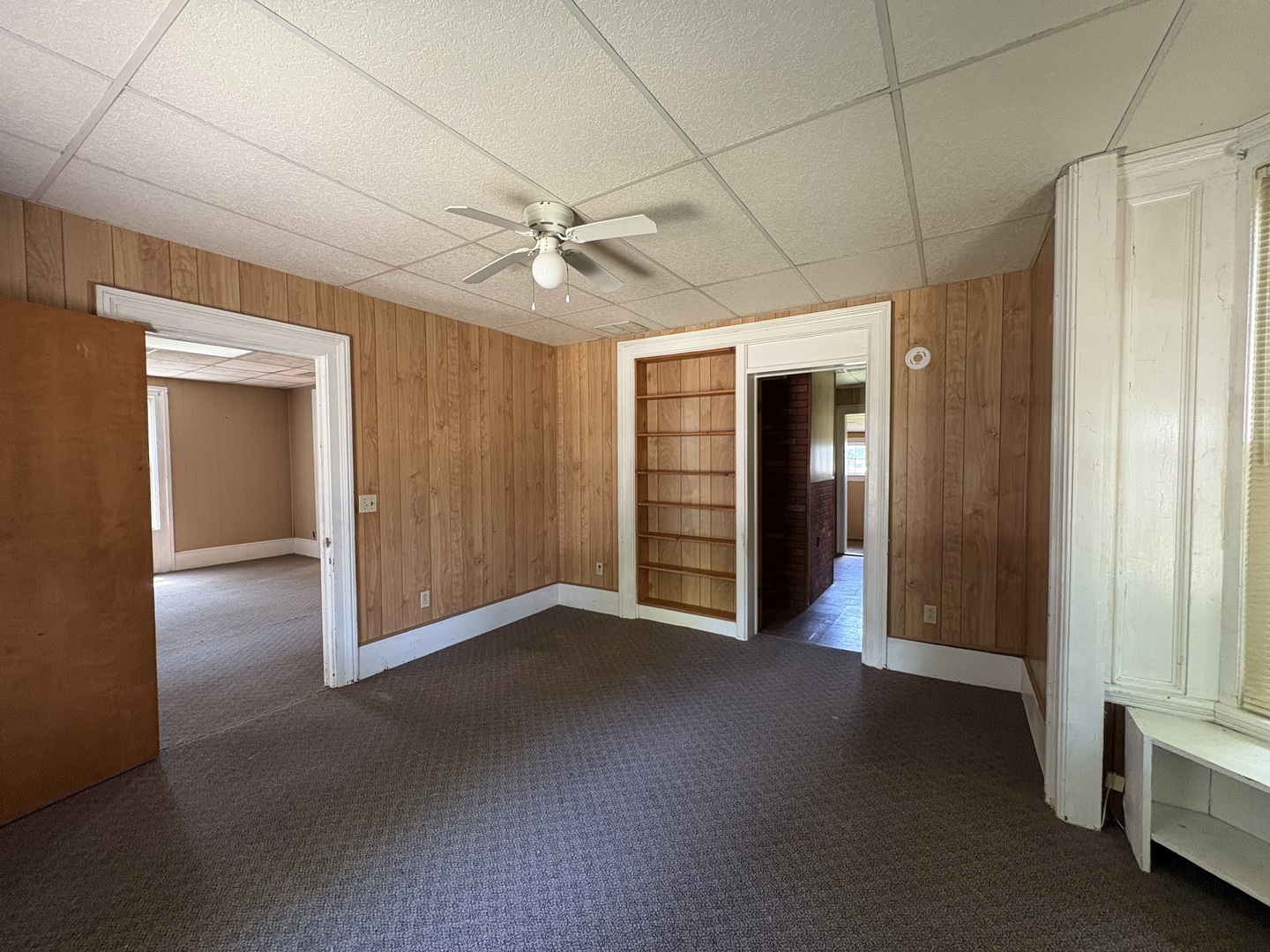 411 Depot Street Mazon, IL 60444 - Photo 5 of 34 a view of empty room with window and ceiling fan