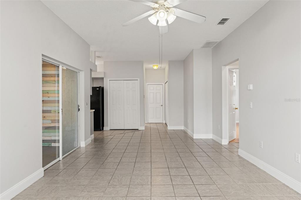 8433 Beachwood Court Spring Hill, FL 34606 - Photo 15 of 38 a view of an empty room with a cabinet