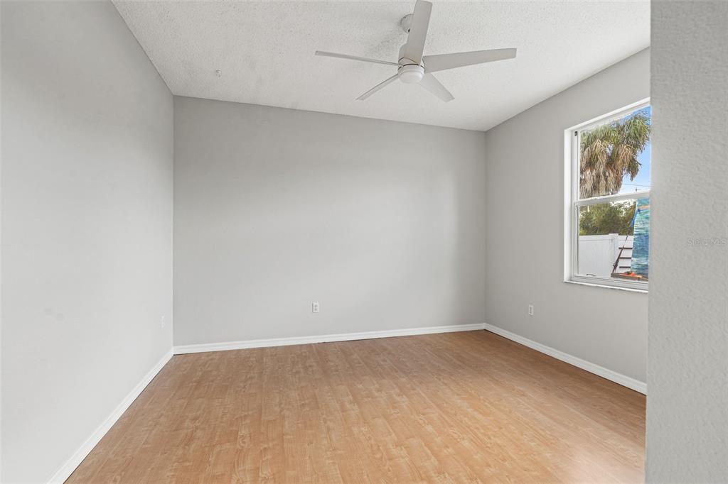 8433 Beachwood Court Spring Hill, FL 34606 - Photo 17 of 38 an empty room with a window