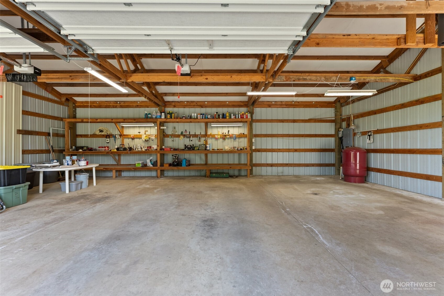 312 McGlaughlin Road Winlock, WA 98596 - Photo 25 of 40 a view of an empty room with wooden ceiling