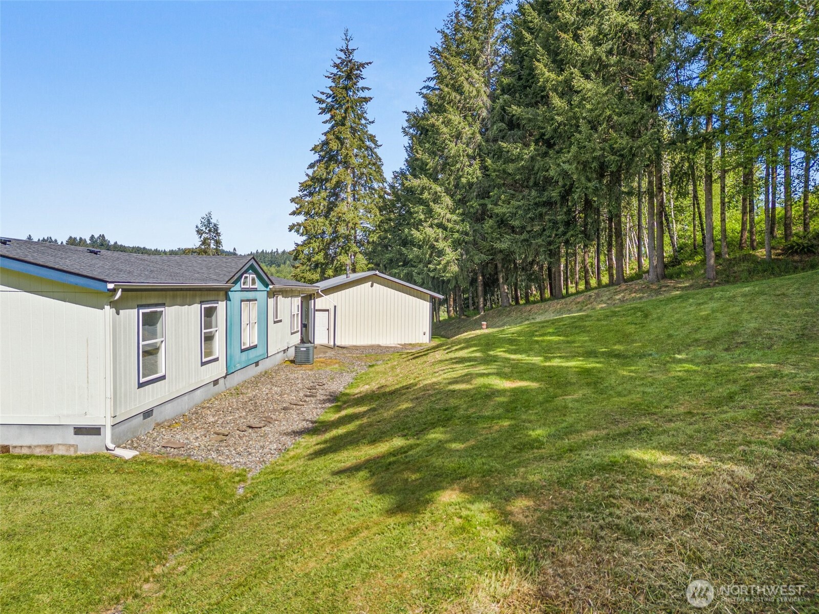 312 McGlaughlin Road Winlock, WA 98596 - Photo 32 of 40 a front view of house with yard and trees
