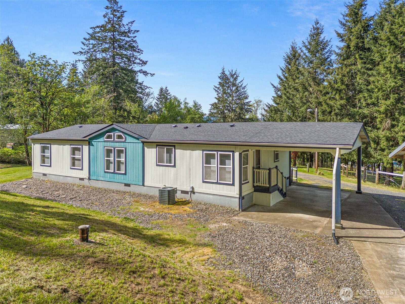 312 McGlaughlin Road Winlock, WA 98596 - Photo 33 of 40 a front view of a house with a yard
