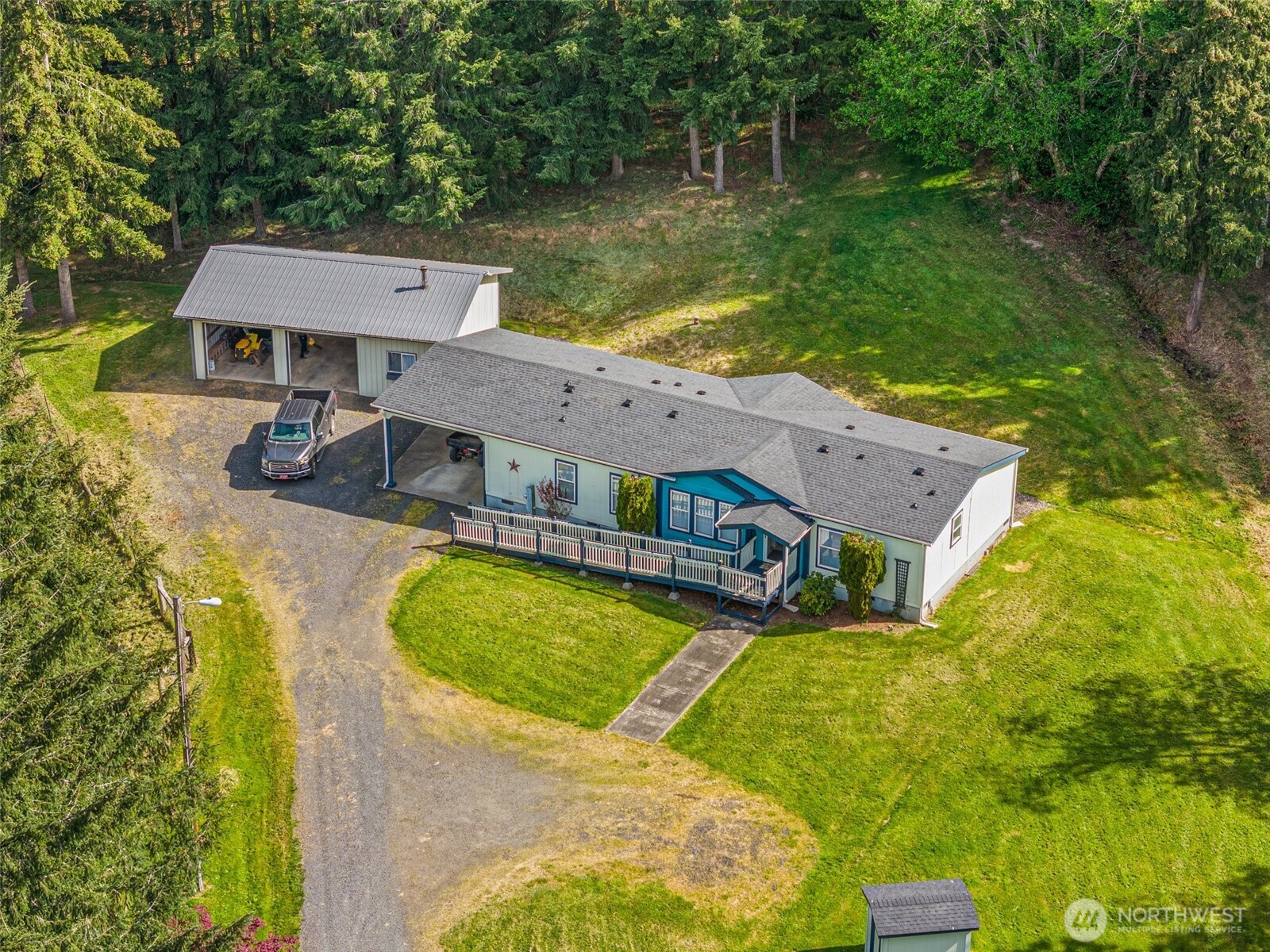 312 McGlaughlin Road Winlock, WA 98596 - Photo 39 of 40 a aerial view of a house with swimming pool and a yard