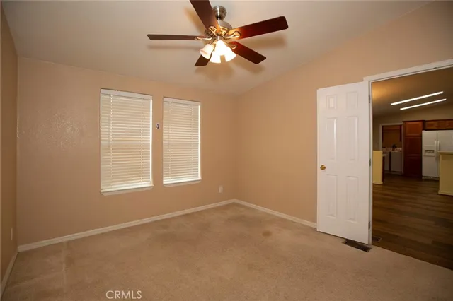 a white toilet sitting next to a bath tub shower