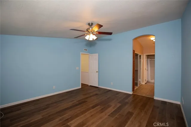 a spacious bathroom with a double vanity sink and a mirror