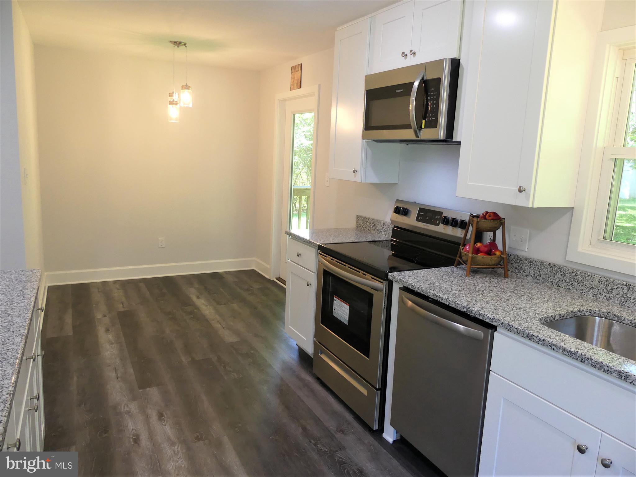 29238 Raccoon Ford Road Burr Hill, VA 22433 - Photo 14 of 30 Dining space adorned with beautiful lighting