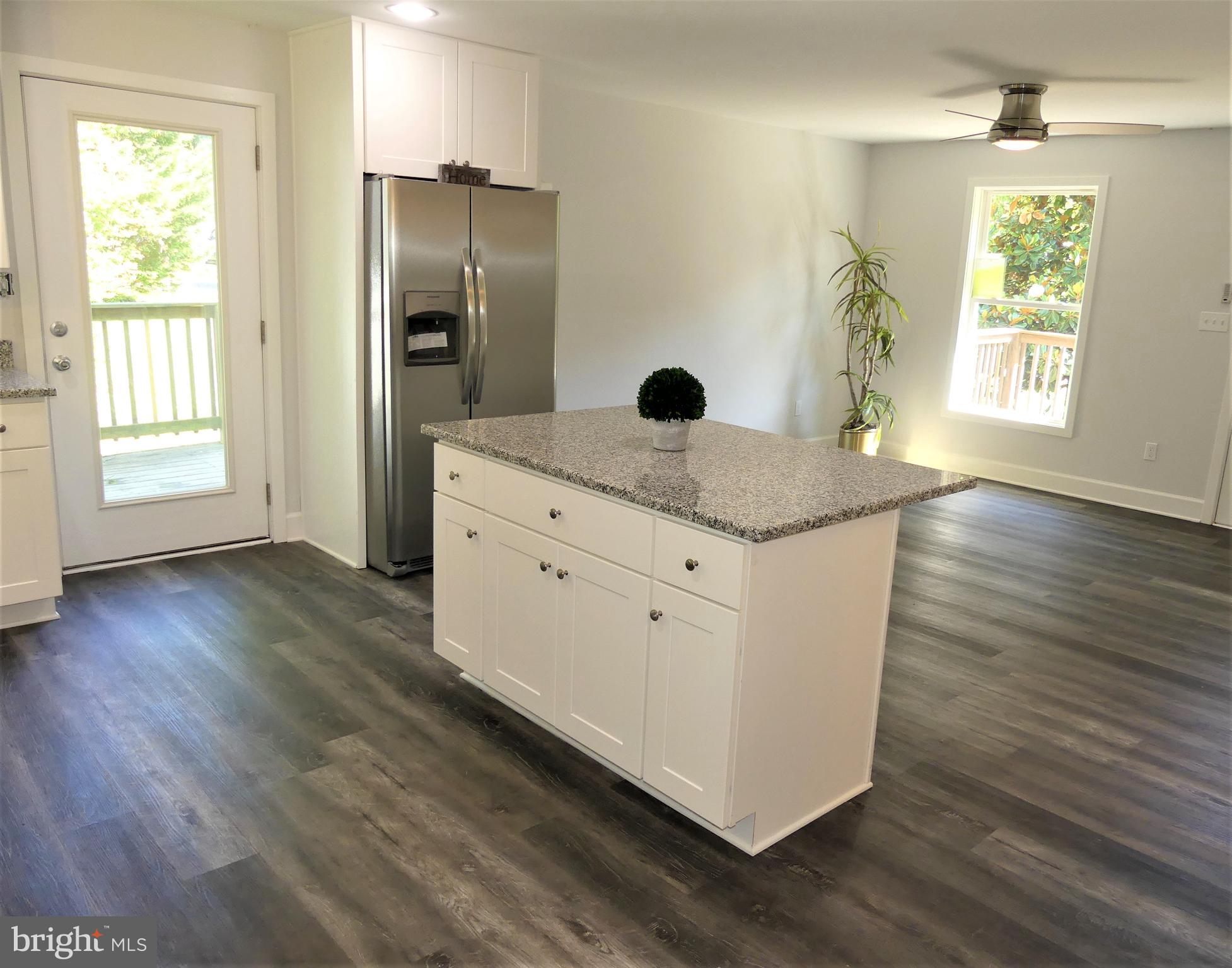 29238 Raccoon Ford Road Burr Hill, VA 22433 - Photo 26 of 30 Wood floors & lots of natural light flow thru home