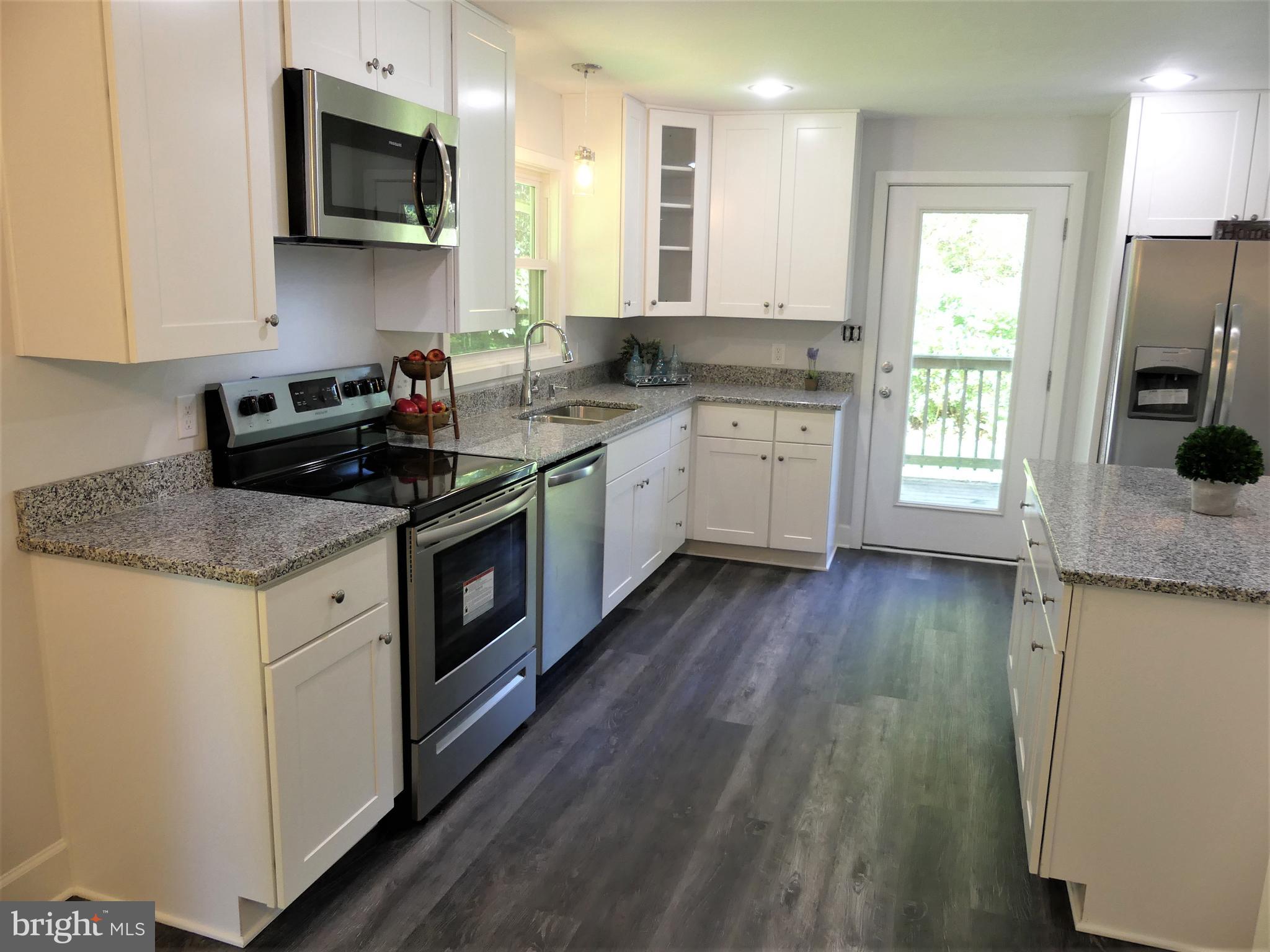 29238 Raccoon Ford Road Burr Hill, VA 22433 - Photo 4 of 30 Gorgeous new hardwoods throughout