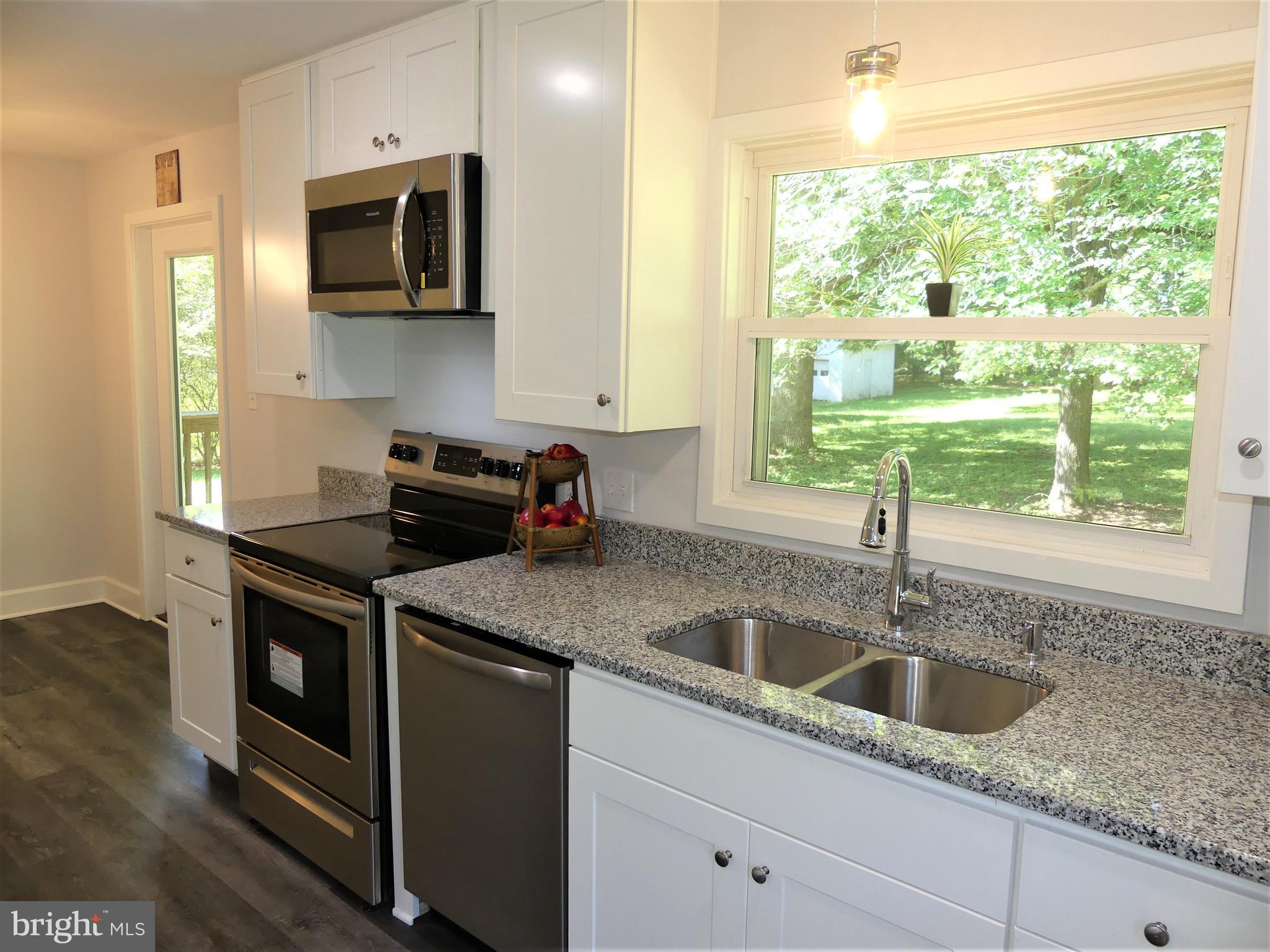 29238 Raccoon Ford Road Burr Hill, VA 22433 - Photo 6 of 30 All new SS appliances complete this kitchen