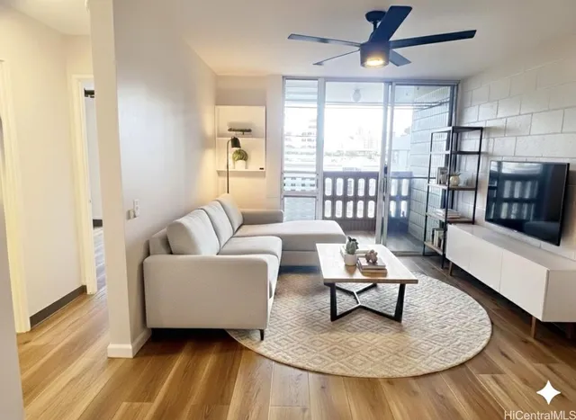 a living room with furniture and a rug