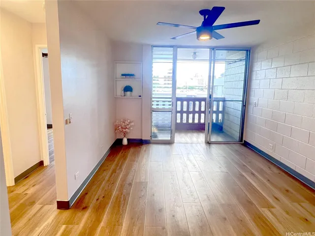 a view of entryway with wooden floor