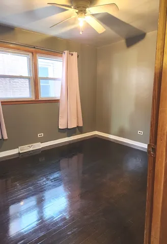 a bathroom with a toilet and a bathtub