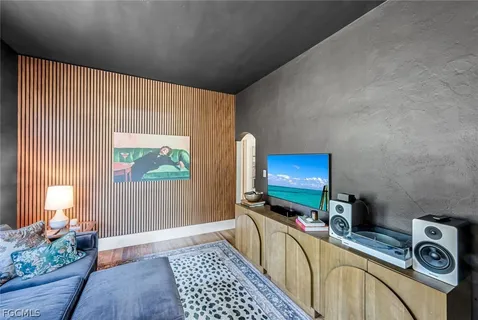 a kitchen with stainless steel appliances kitchen island granite countertop a sink and cabinets