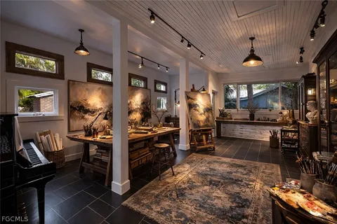 a view of a room with porch and wooden floor
