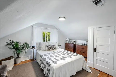 a view of a swimming pool with lounge chairs