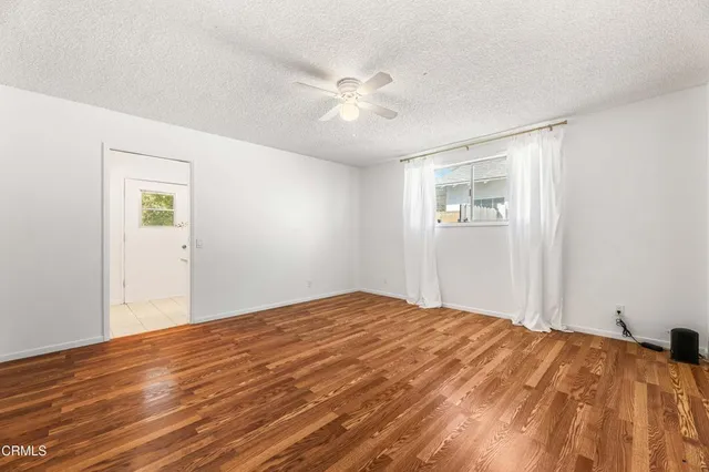 a bathroom with a sink a mirror and a shower