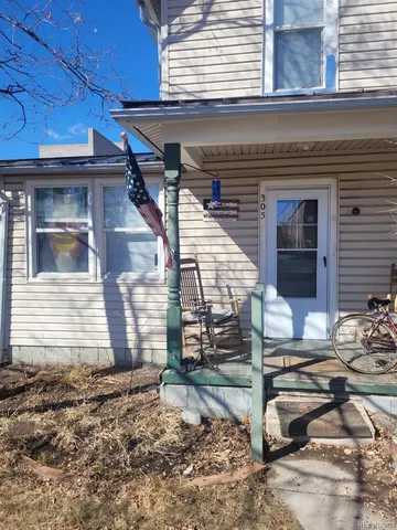 a view of a house with a patio
