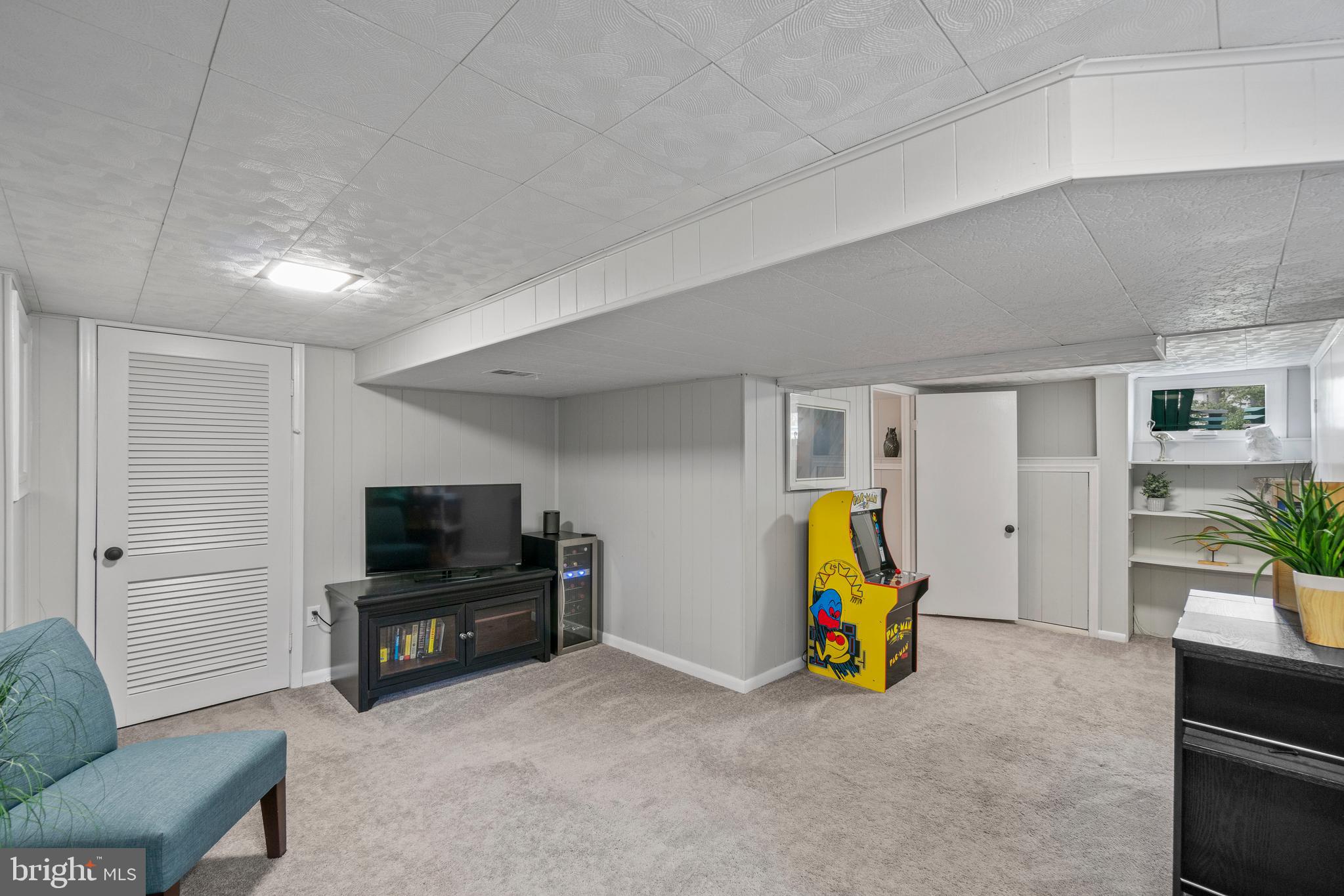 2713 Emmet Road Silver Spring, MD 20902 - Photo 26 of 45 lower level rec room , with shelving