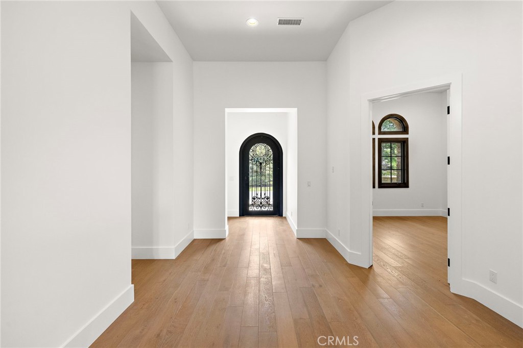 7 Alexa Lane Ladera Ranch, CA 92694 - Photo 11 of 75 a view of a room with wooden floor