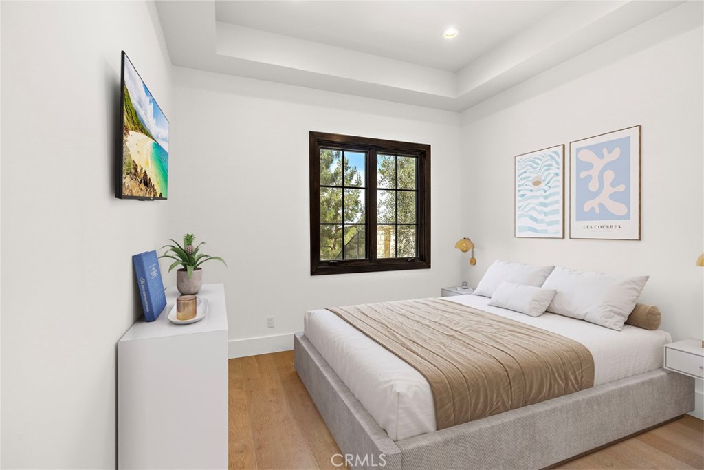 7 Alexa Lane Ladera Ranch, CA 92694 - Photo 17 of 75 a bedroom with a bed and a window