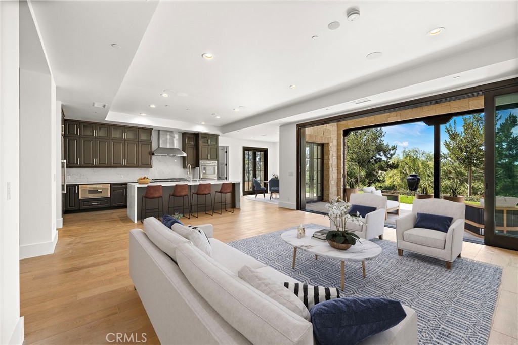 7 Alexa Lane Ladera Ranch, CA 92694 - Photo 35 of 75 a living room with furniture and a large window