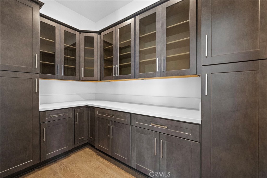 7 Alexa Lane Ladera Ranch, CA 92694 - Photo 37 of 75 a kitchen with a sink and cabinets