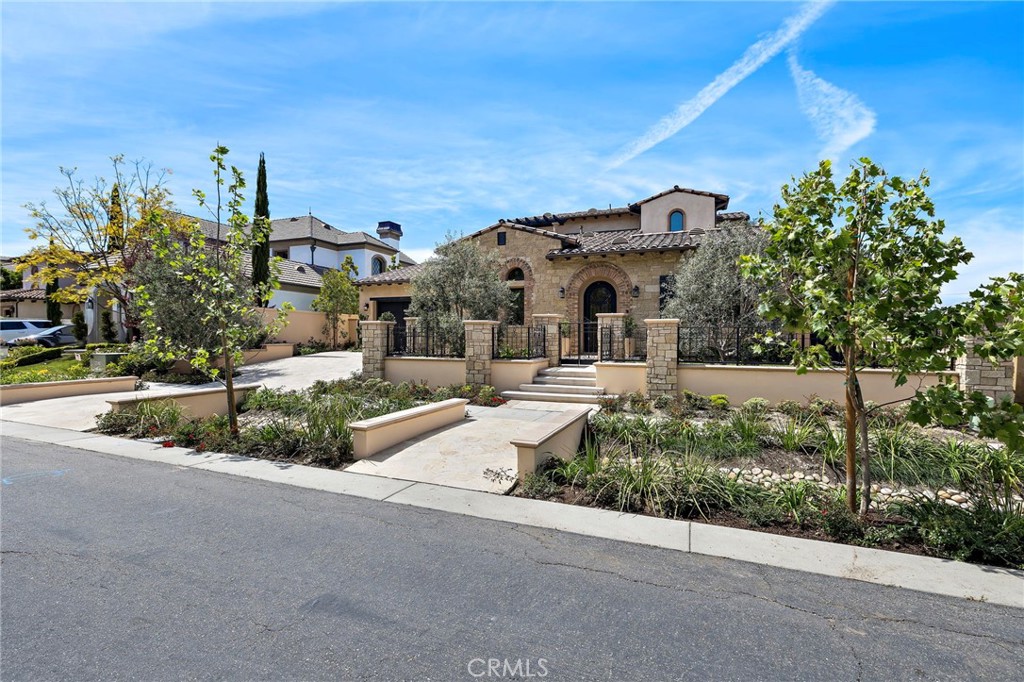 7 Alexa Lane Ladera Ranch, CA 92694 - Photo 4 of 75 front view of a house with a street