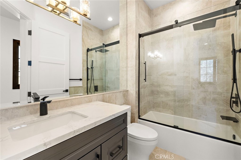 7 Alexa Lane Ladera Ranch, CA 92694 - Photo 45 of 75 a bathroom with a sink and a mirror