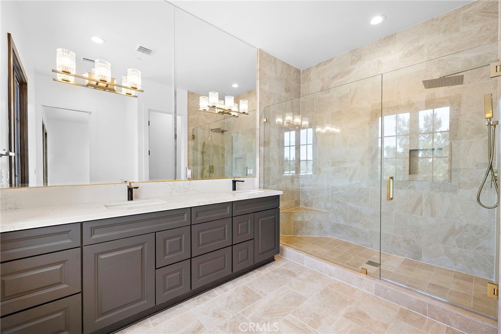 7 Alexa Lane Ladera Ranch, CA 92694 - Photo 53 of 75 a bathroom with a double vanity sink mirror and shower