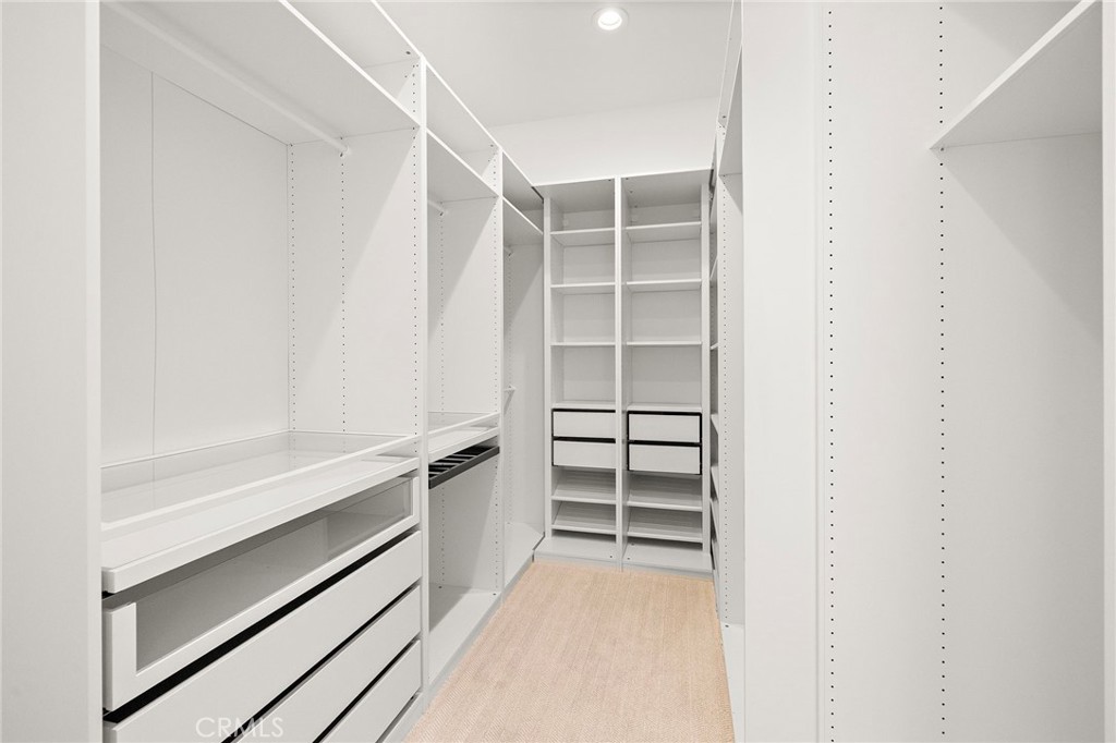 7 Alexa Lane Ladera Ranch, CA 92694 - Photo 59 of 75 a view of walk in closet with empty racks