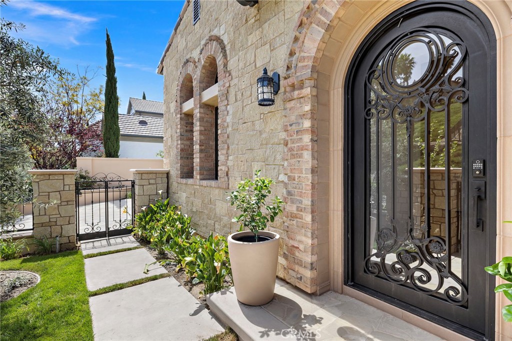 7 Alexa Lane Ladera Ranch, CA 92694 - Photo 10 of 75 a view of a house with a fountain and a garden