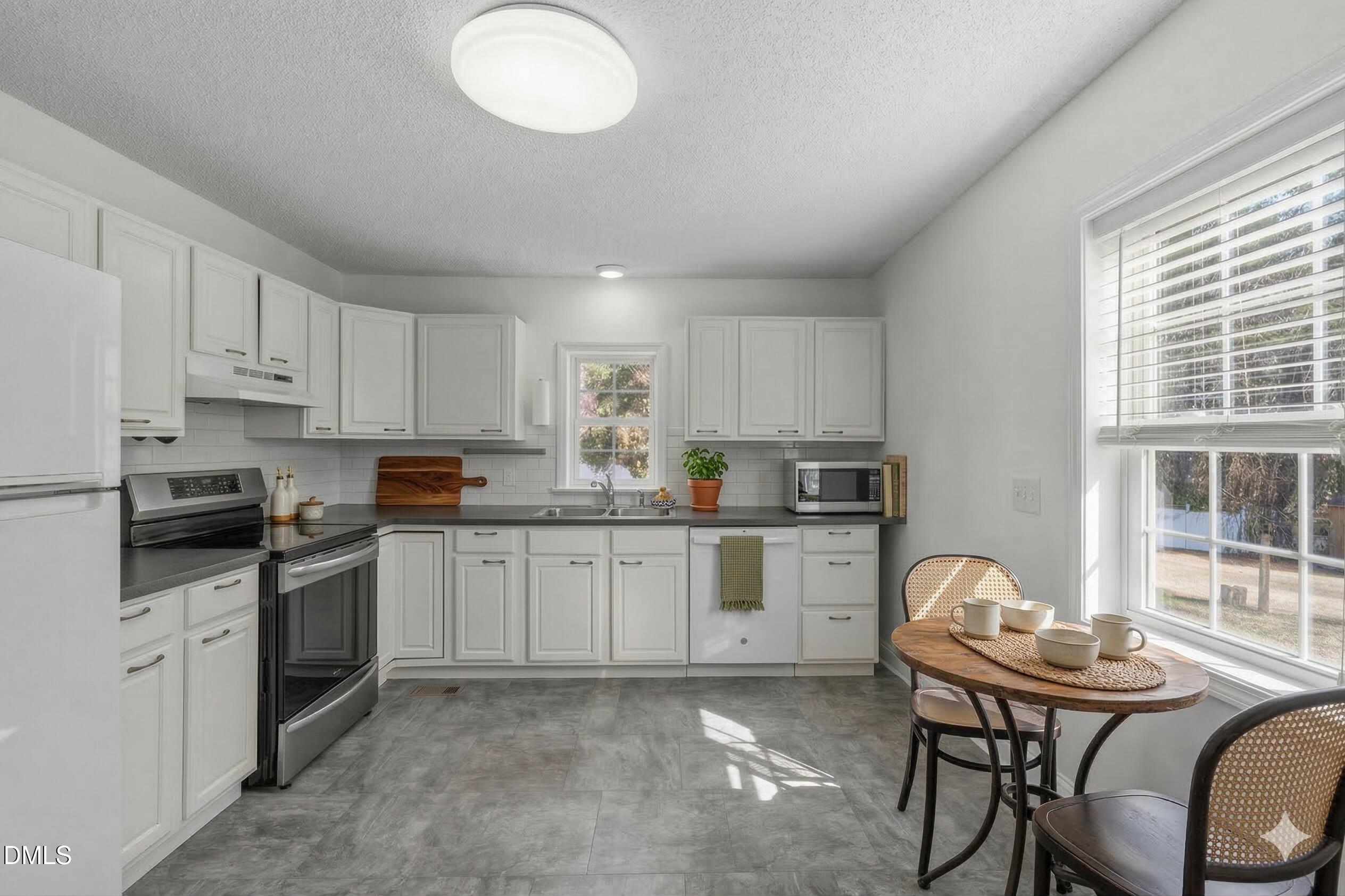 5221 Old Powell Road Holly Springs, NC 27540 - Photo 4 of 20 Kitchen staged
