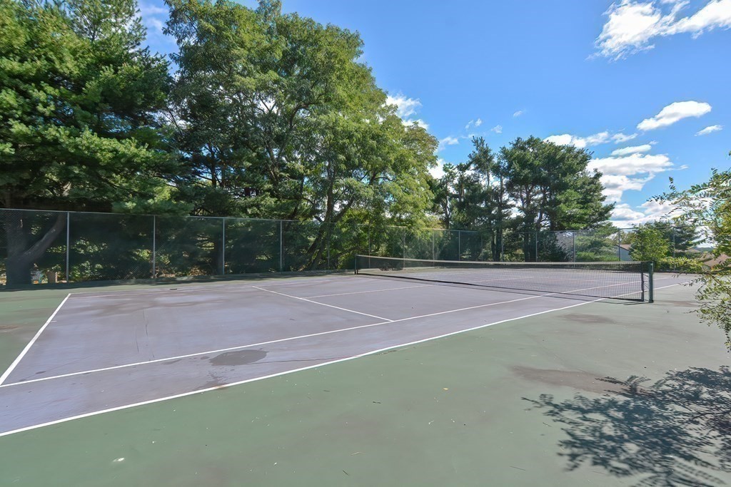 801 Franklin Crossing Road, Unit 801 Franklin, MA 02038 - Photo 34 of 38 a view of a tennis court