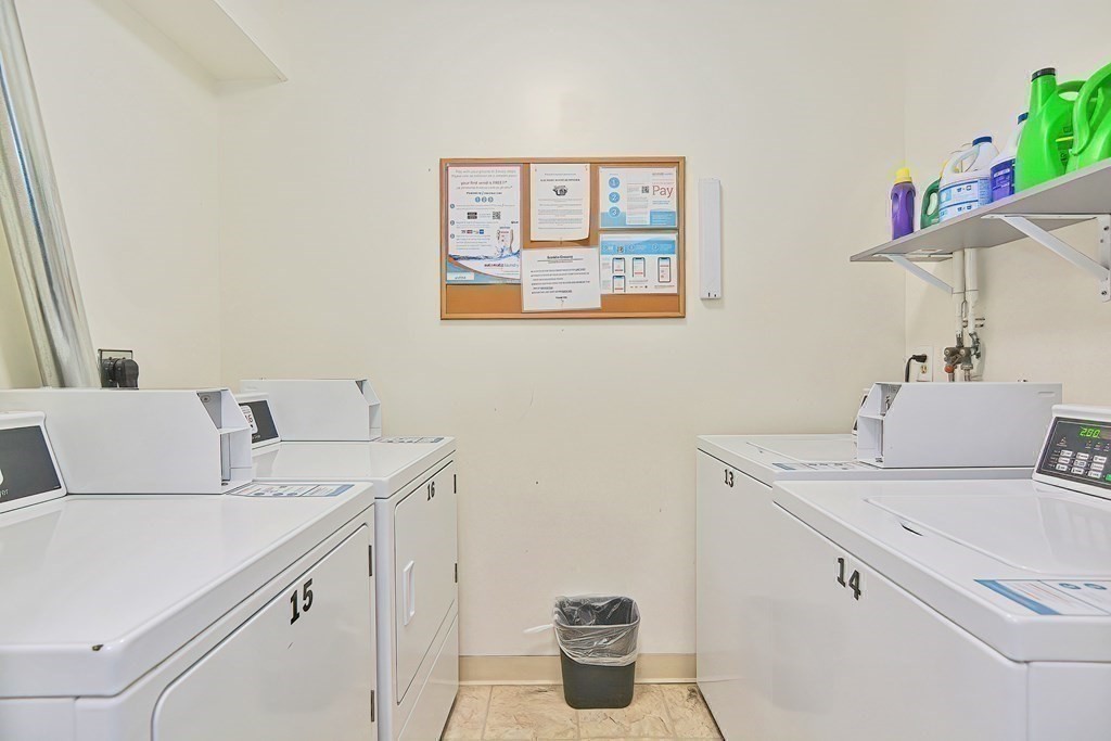 801 Franklin Crossing Road, Unit 801 Franklin, MA 02038 - Photo 37 of 38 a bathroom with a sink and a toilet