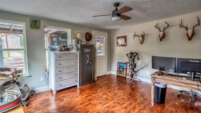 a view of a workspace with furniture