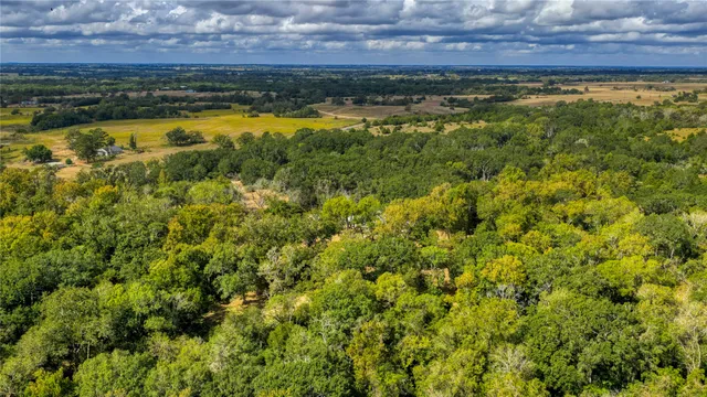 a view of a swimming pool and an outdoor space