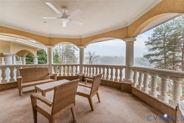 a view of a livingroom with furniture and a window